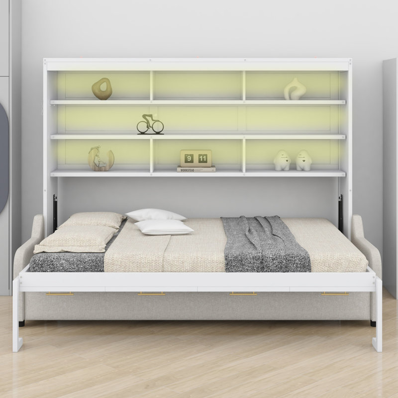 Lit escamotable avec canapÃ© et Ã©tagÃ¨res de rangement intÃ©grÃ©es, idÃ©al pour les petits appartements