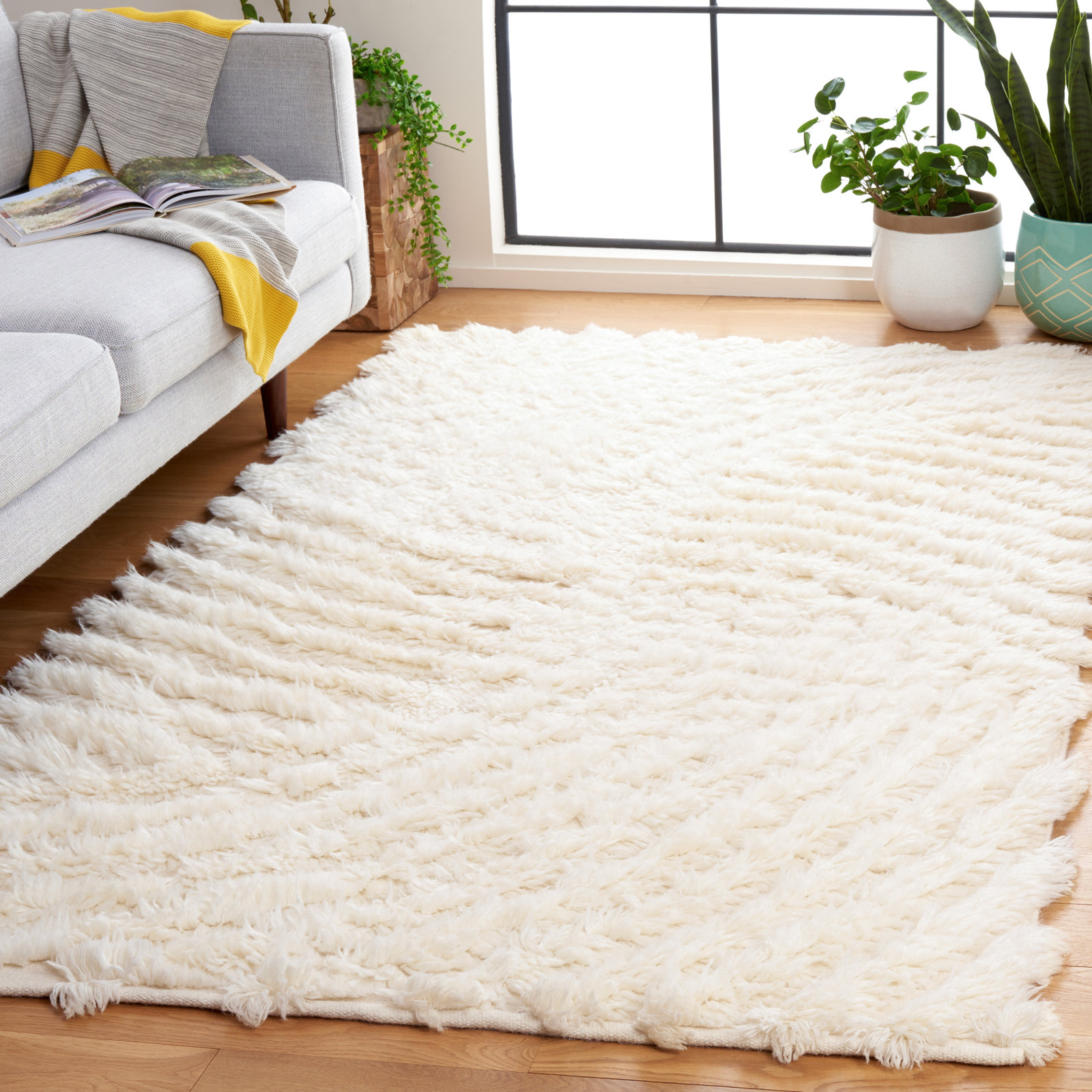 Abriel Ivory Hand-Woven Abstract Wool Rug, Rectangle 5' x 8'