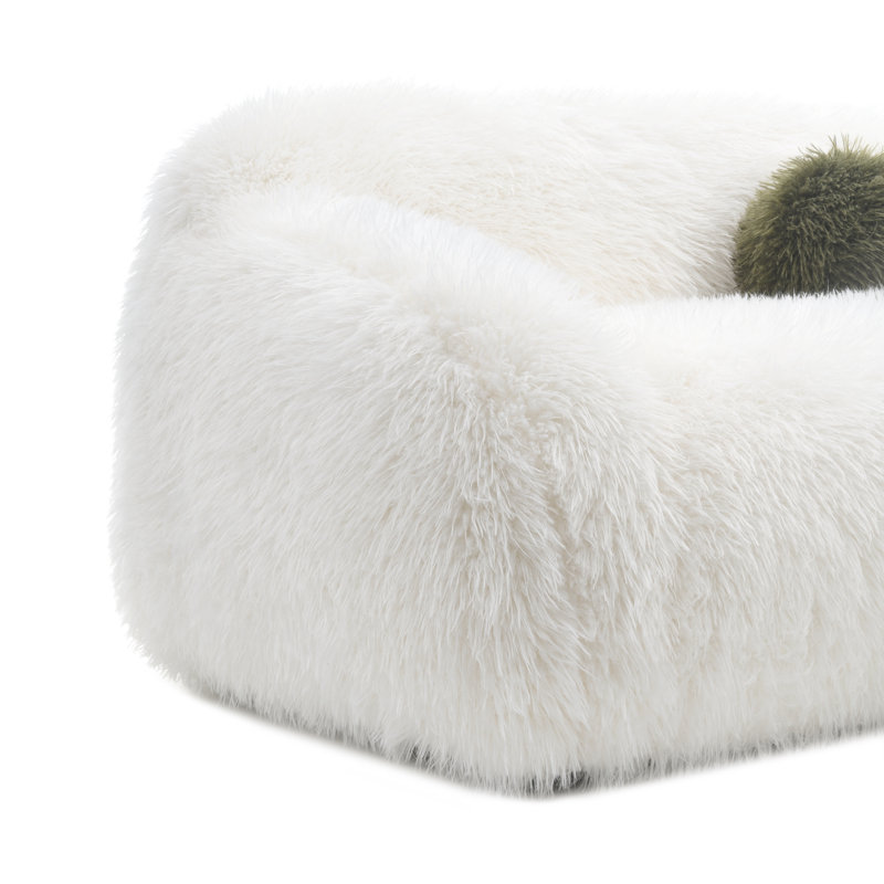 Canapé Harry en fausse fourrure avec coussin boule, Blanc