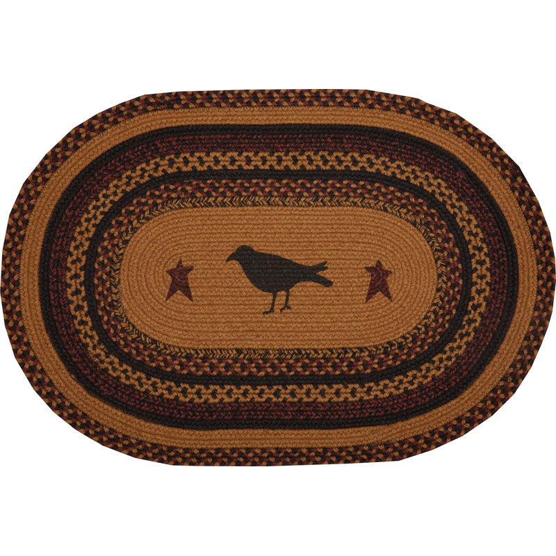 Oval Braided Jute Rug with Crow Design in Black and Mustard