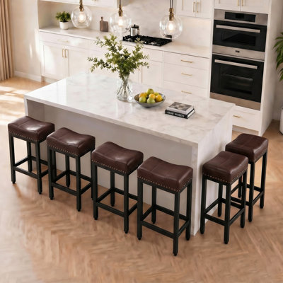 Michille Saddle Upholstered 24.21" Counter Stool