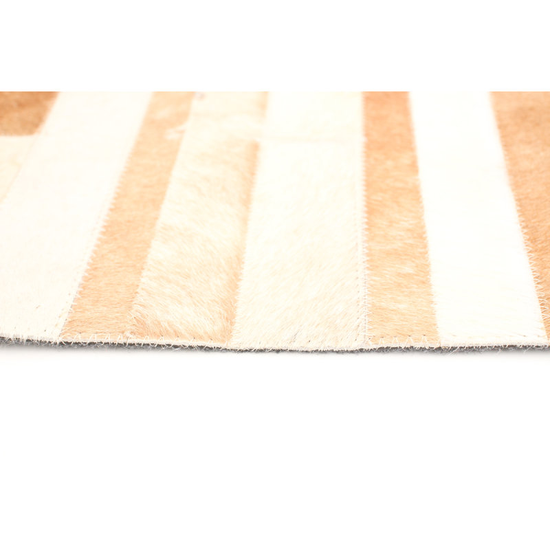 Avnee Cowhide Abstract Indoor Rug