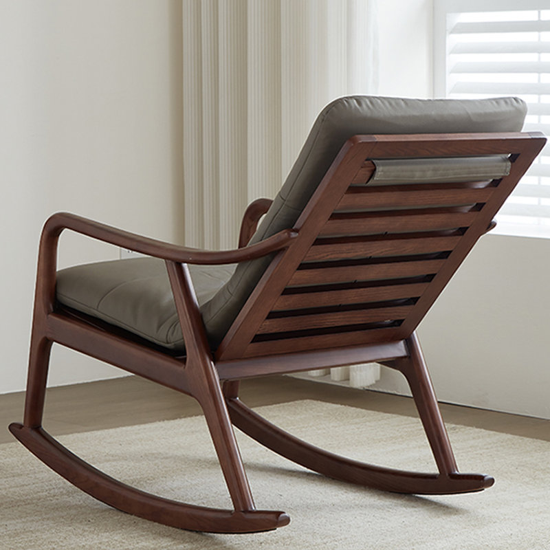 Chaise berçante en similicuir avec coussin amovible