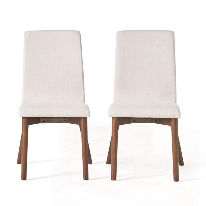 Élégante chaise de salle à manger avec rembourrage confortable et structure durable, parfaite pour les salles à manger modernes et traditionnelles.