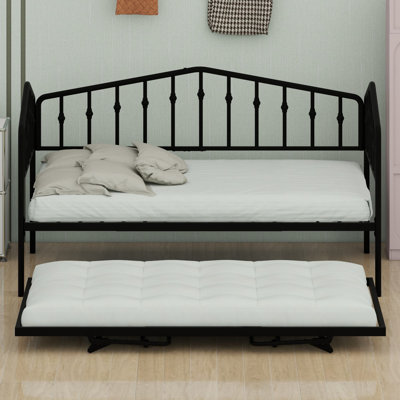 Lit de jour avec lit gigogne ajustable, double l'espace d'accueil des invités grâce à sa construction stable et durable.