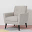 Fauteuil club en tissu beige: confort intemporel et élégance contemporaine
