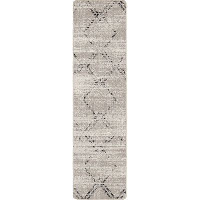 Tapis à motif géométrique Res Resence