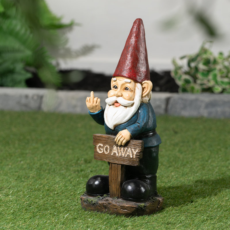 Gnome tenant une pancarte de jardin