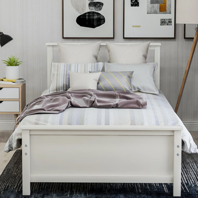 Lit plateforme simple en bois massif avec tête de lit