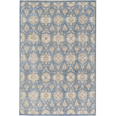 Tapis bleu de haute qualité noué à la main