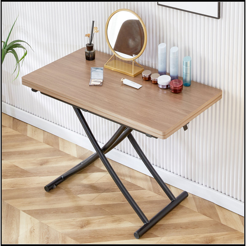 La table de levage moderne et minimaliste moderne, avec un bureau autocollant de grain de bois de 0,8 pouce et des pieds en métal noir, peut être utilisée comme coiffeuse, table basse, table de salle à manger et table de bureau