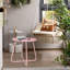 Table d'extérieur en fer rose