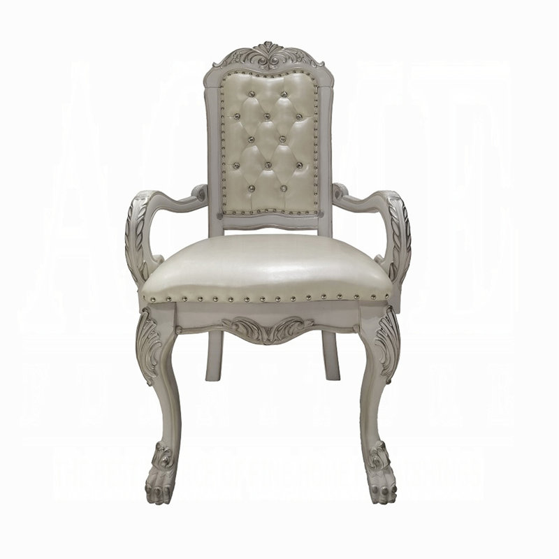Ensemble de 2 fauteuils capitonnés ivoire et blanc os