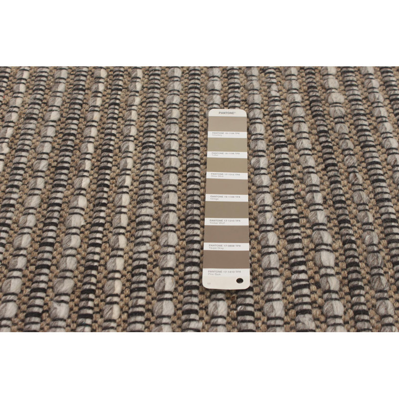 Tapis taupe en laine tressé à la main Caribe
