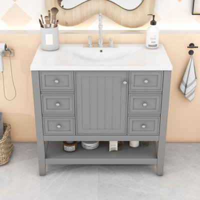 Meuble-lavabo avec une armoire et trois tiroirs