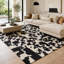 Tapis en cuir de vachette noir et blanc fabriqué à la main avec patchwork-141757262