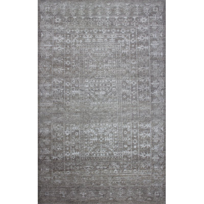Tapis oriental en laine noué à la main Deshaun