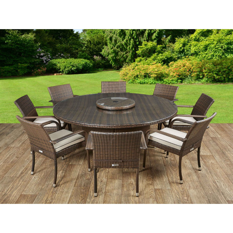 Kiska 8 - Person Patio Dining Set with Round Table , Cushions Included, Chocolate/Cream