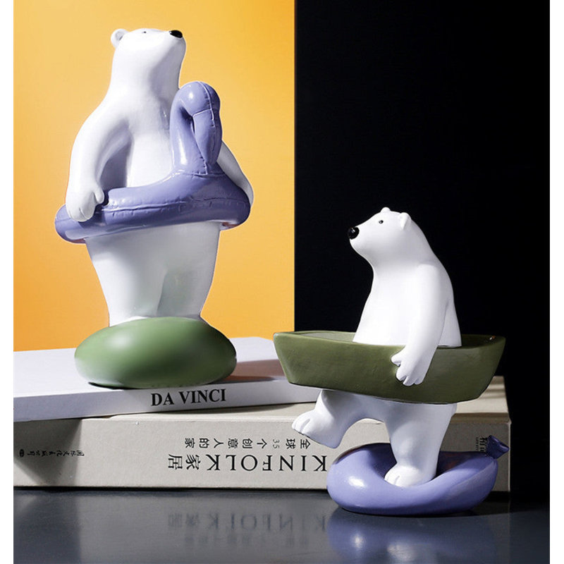 Mignonne statue d'ours avec tube de natation en mauve