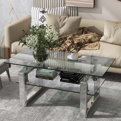Table basse rectangulaire avec plateau en verre et tablette