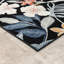 Tapis tropical à feuilles-115997527