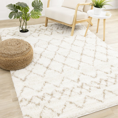 Tapis à motif de treillis géométrique beige Kostantza