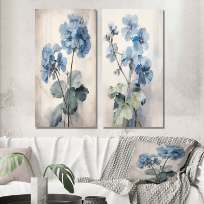 Ensemble de 2 décorations murales bleues et géraniums bleues et blanches