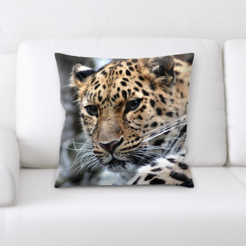 Coussin en jeté leopard