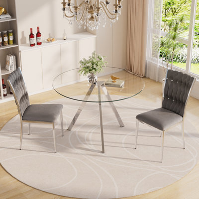 Ensemble de table de salle à manger en verre avec chaises rembourrées en velours