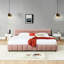 Très grand lit tapissier rose avec tête de lit et tiroir pour une chambre confortable avec des tiroirs en chenille