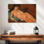 Leisha nue sur un coussin bleu
