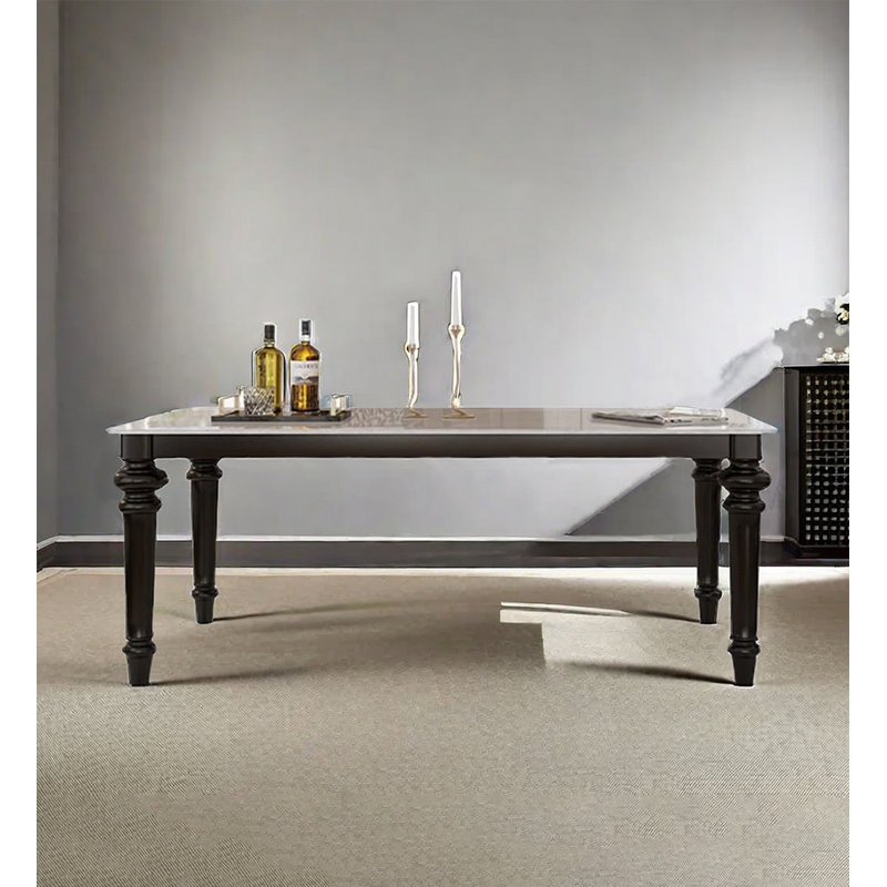 Table de salle à manger noire de style américain rétro avec plateau en pierre frittée et structure en bois massif, de forme rectangulaire