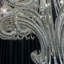 Lustre de luxe dramatique en cristal d'inspiration pieuvre avec accoudoirs perlés en cascade