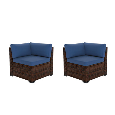 Chaise d'extérieur en osier avec coussins