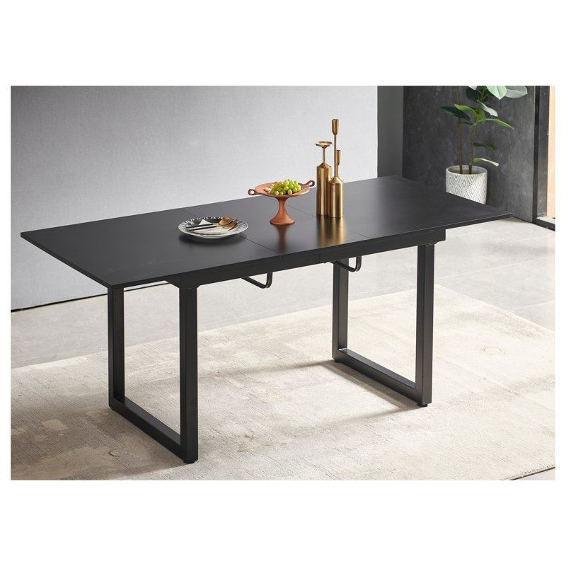Table de salle à manger extensible noire avec pieds en métal