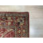 Tapis oriental en laine touffeté rouille