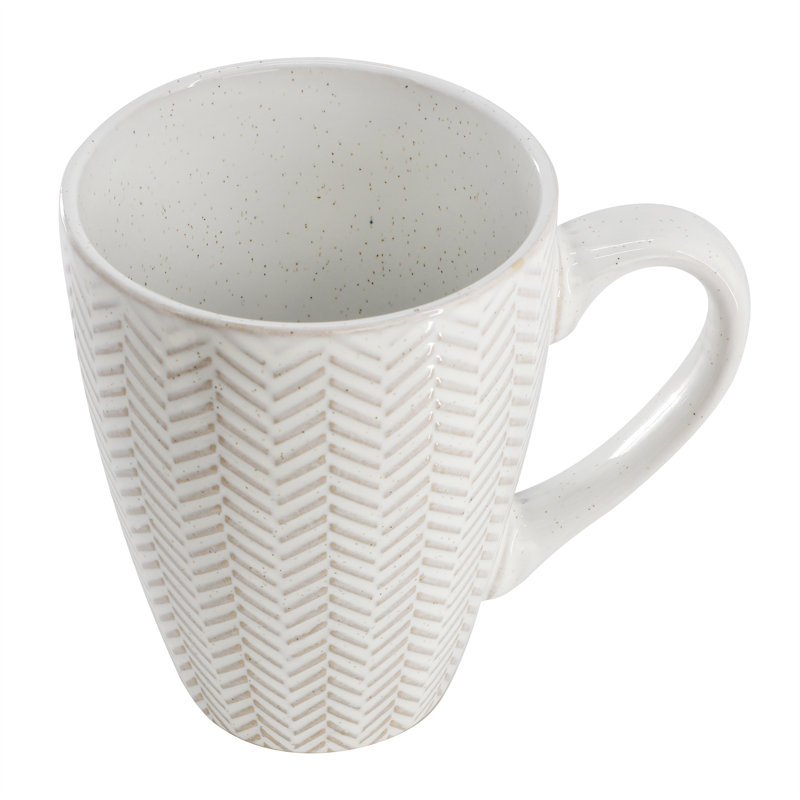 Gibson Elite Earlhart 4 Piece 16 Ounce Stoneware Assorted Pattern Mug Set in White