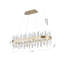 This Exquisite LED Chandelier Is In A Gold Finish. The Frame Is Made Out Of Stainless Steel In An Oval Shape, And The LED Bulbs Are Integrated Into The Frame. It Also Comes With Clear Crystal Accents. The Adjustable Cord Links Make This Fixture Suitable F