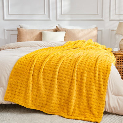 NEWCOSPLAY Super Soft Throw Blanket Mustard Yellow Premium Silky Flannel Fleece 3D Waffle Checkered Lightweight Bed Blanket All Season Use (Mustard Yellow Waffle, Throw(50"x70"))