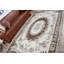 Élégant tapis turc à motif floral brun et crème parfait pour rehausser l'esthétique de votre salon