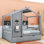 Lit plateforme en bois avec lit gigogne et tablettes de rangement, forme maison
