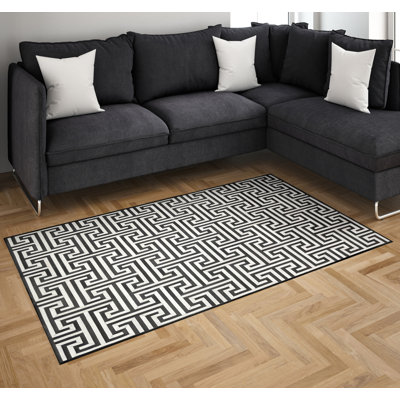 Tapis géométrique moderne en peau de vache gris et beige
