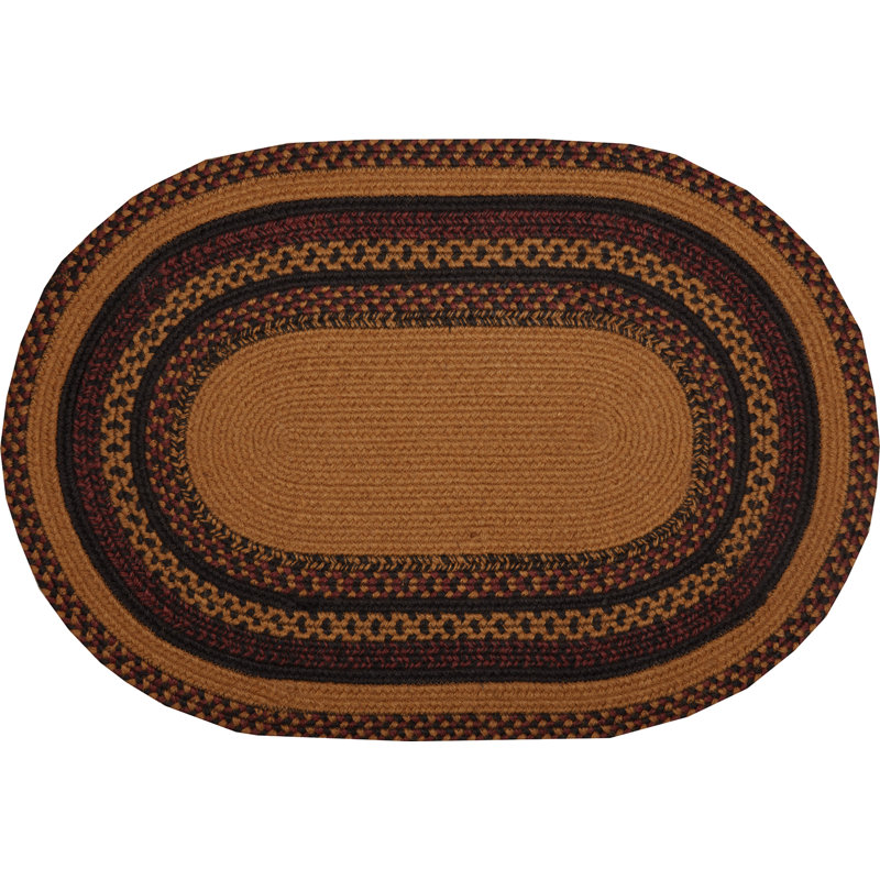 Oval Braided Jute Rug with Crow Design in Black and Mustard