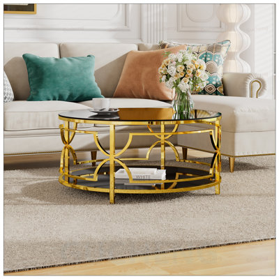 Table basse ronde en verre trempé avec structure luxueuse en métal et tablette inférieure, parfaite pour les intérieurs modernes