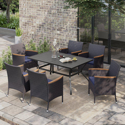 6 - Person Steel Patio Dining Set Umbrella Hole Included Rectangular Table with Cushions Included