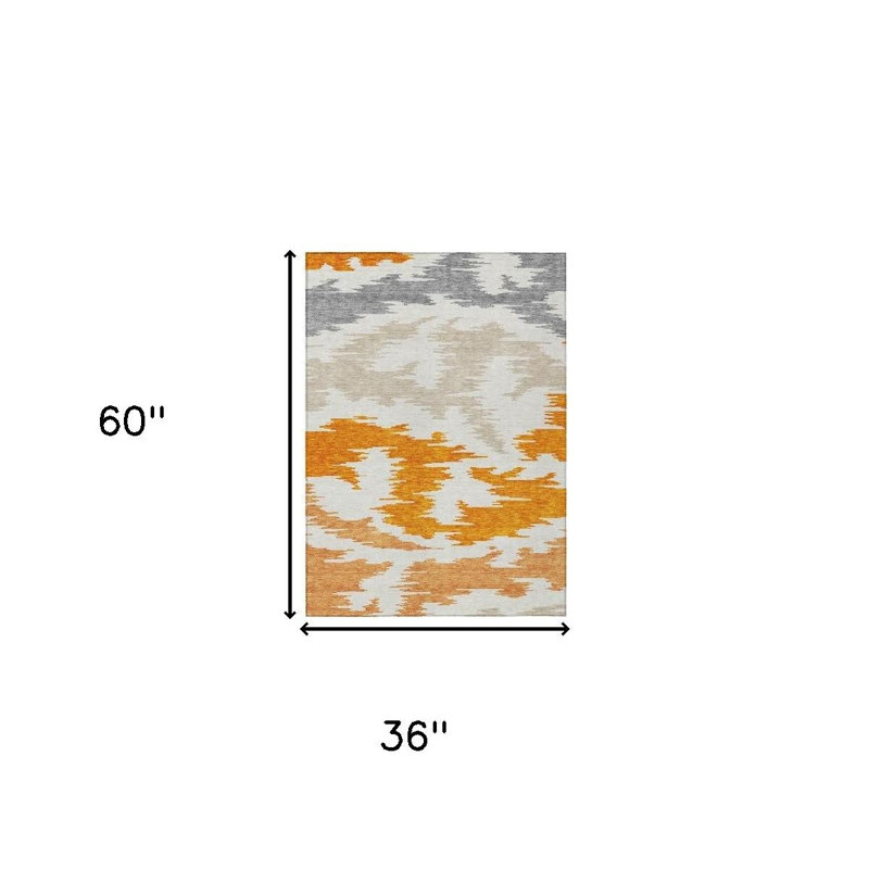 3' X 5' Orange Beige And Ivory Abstract Washable Indoor Outdoor Area Rug