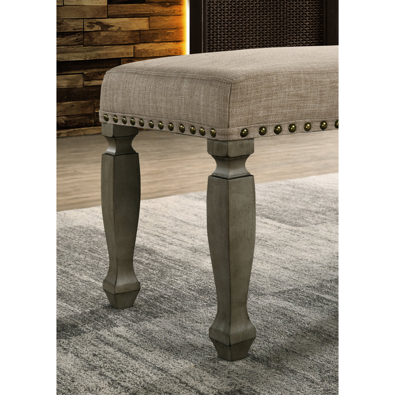 Banc rembourré avec coussin brun clair et pieds en bois gris