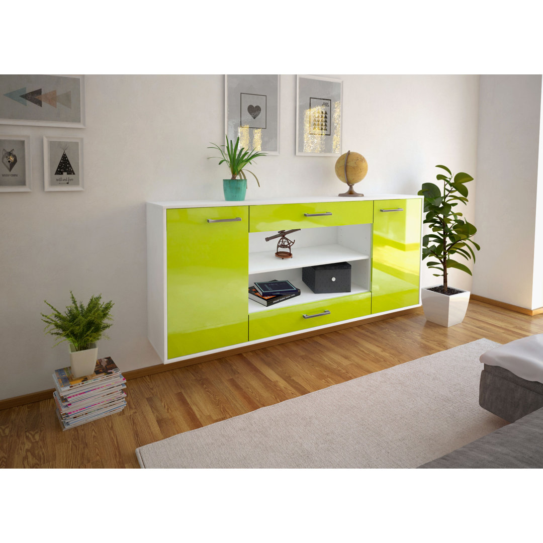 Das Sideboard Mussab hat Metallgriffe. Es hat die Maße 180 cm x 79 cm x 35 cm.