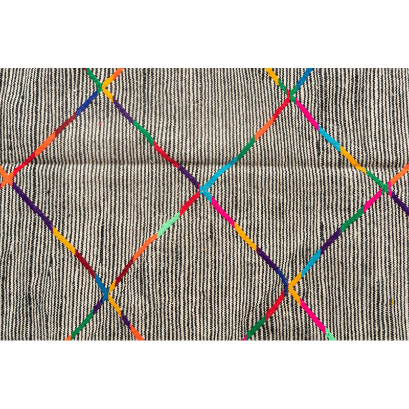 Tapis noir Parra