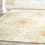 Tapis beige / doré en laine touffeté à la main Mccullough-1732584512